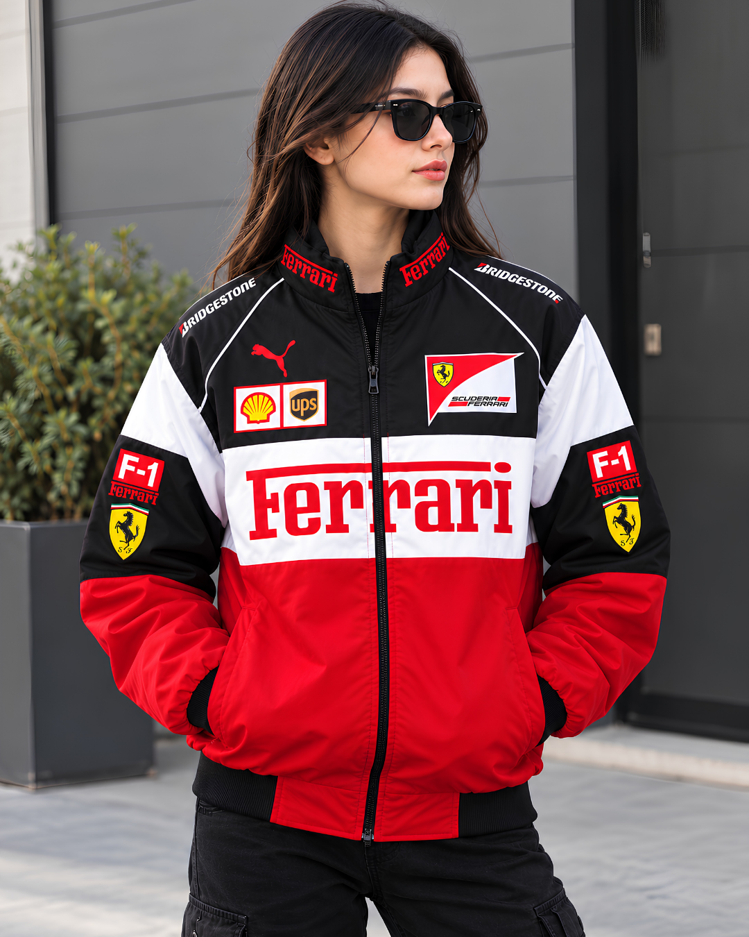 Female model wearing black red white Ferrari inspired racing jacket front view
