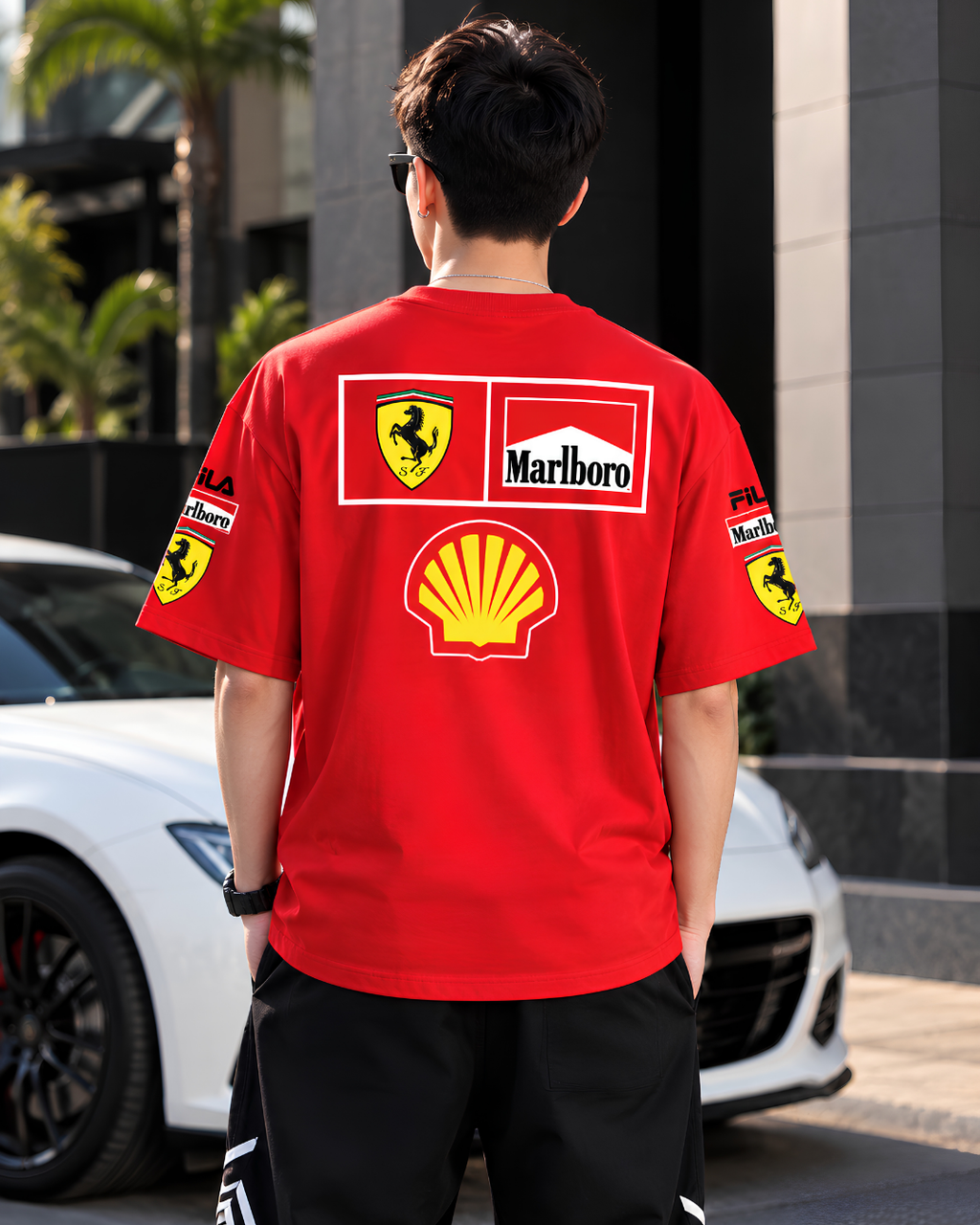 Men's red motorsport graphic T-shirt with racing sponsor prints